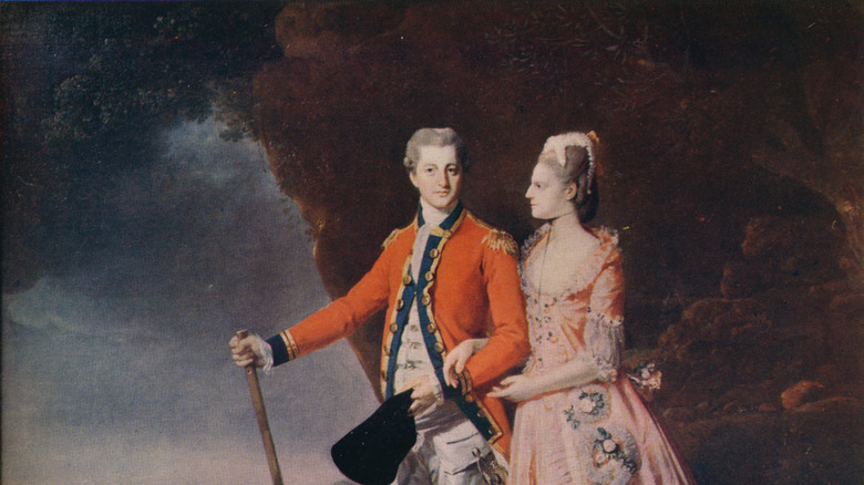 A painting of a man and woman in historical British dress in the Albany Institute of History and Art