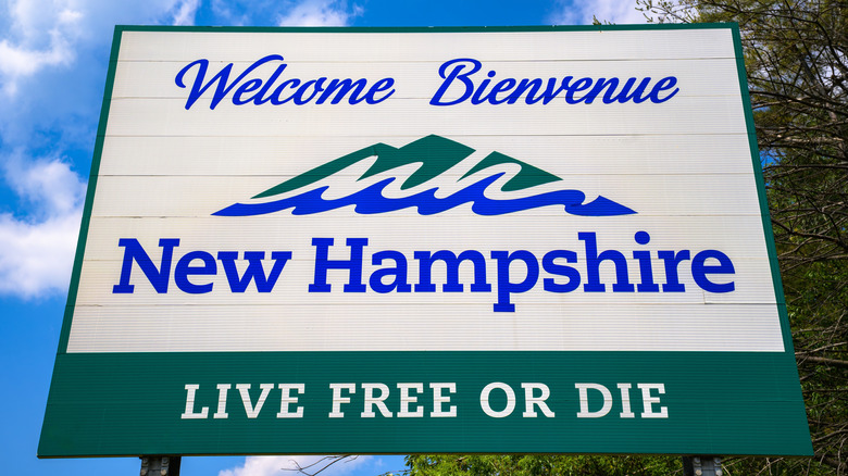 Road sign welcomes people to New Hampshire