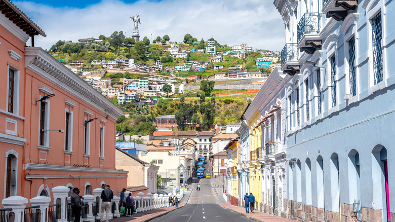A view through historic street up to El Panecillo Hill in Quito, Ecuador