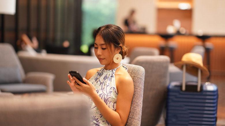 Traveler sitting at an airport lounge