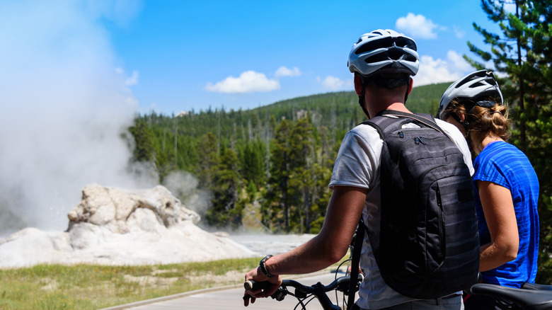 Cyclists pause to observe beauty of Yellowstone National Park