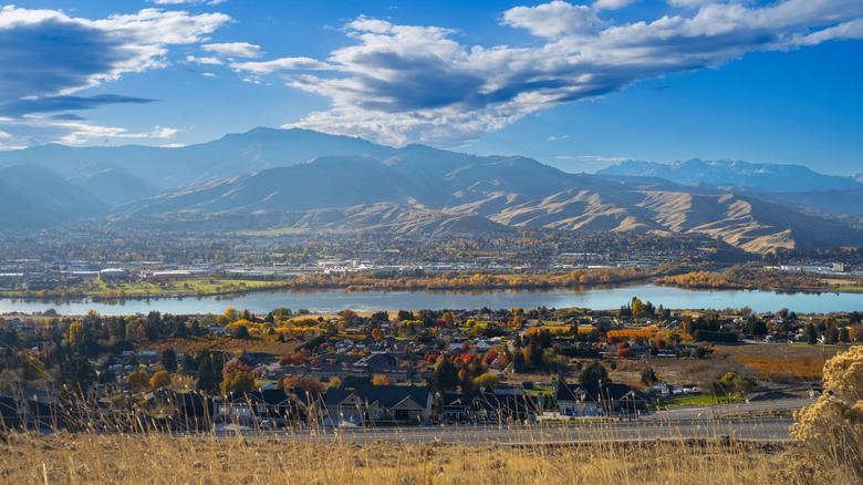 A viewpoint overlooking the Columbia River, downtown Wenatchee, and the surrounding mountains in Washington.
