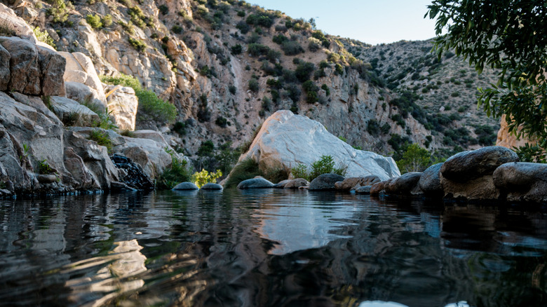 Rocks surrounding the water at Deep Creek Hot Springs pool in Apple Valley, California
