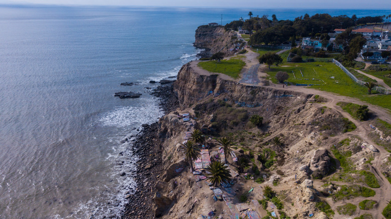 Aerial view of Sunken City cliffs next to Pacific Ocean in San Pedro, California