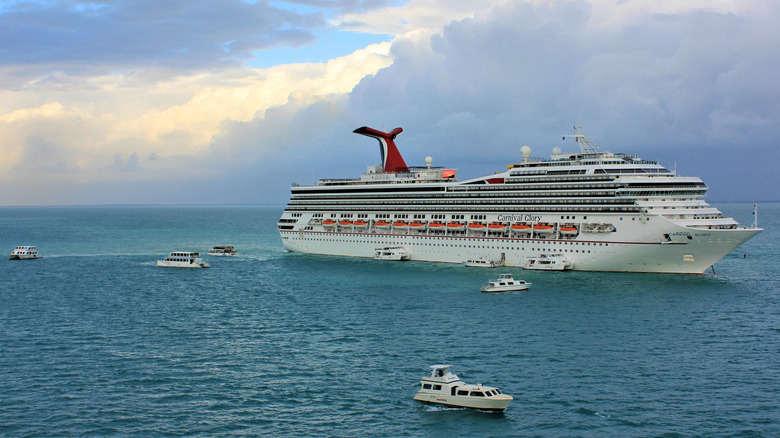 View of tenders taking people back and forth on cruise ship near Belize City, Belize