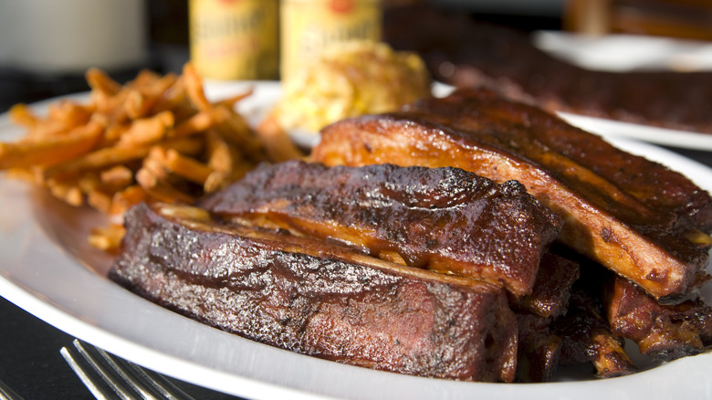 Kansas City barbecue on a platter with fries.