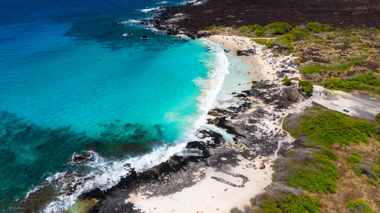 An aerial shot of Manini'owali Beach in Hawaii