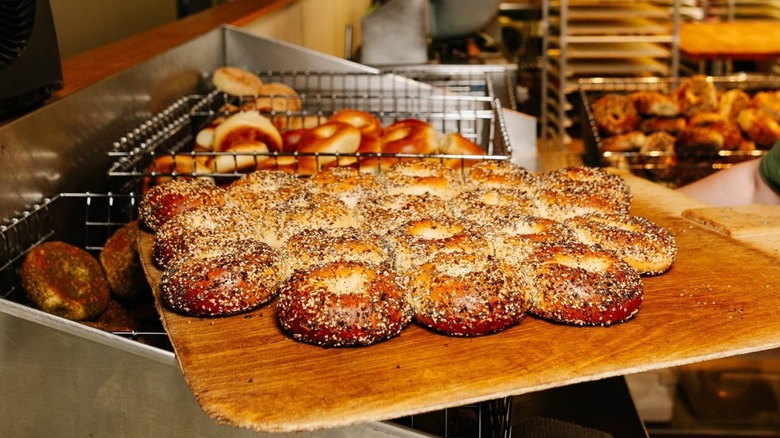 Onion and plain bagels for sale at a shop