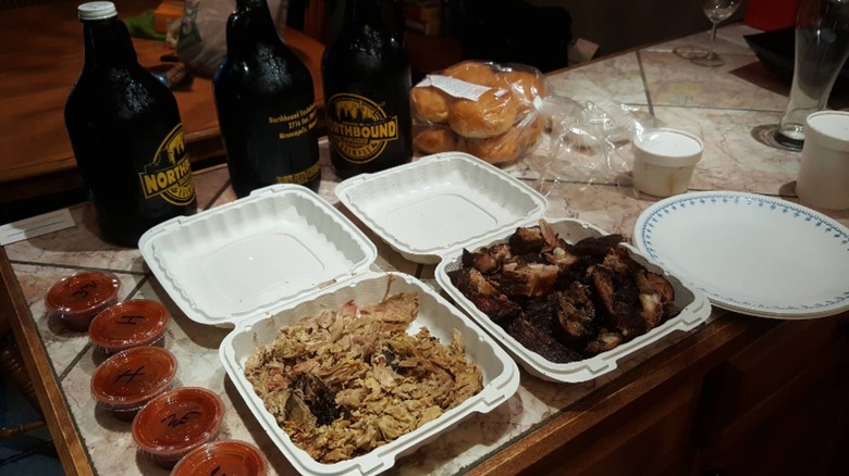 Two takeaway trays of meat at Ted Cooks 19th Hole