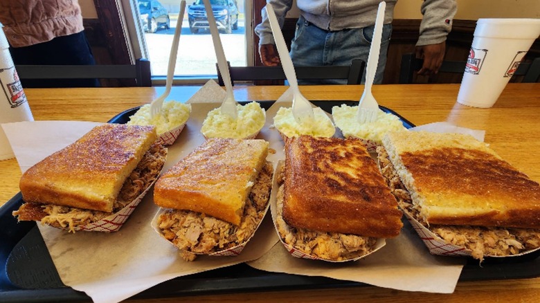 Four pork sandiwches at Skylight Inn in North Carolina
