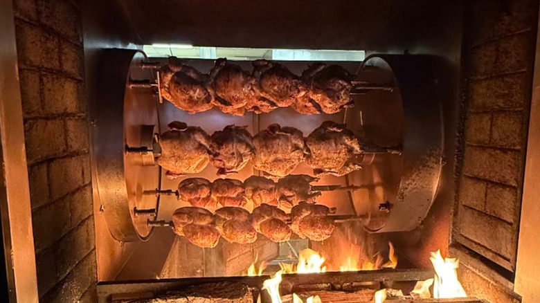 Chickens on woddfired spit at Spitfire Bar and Grrill