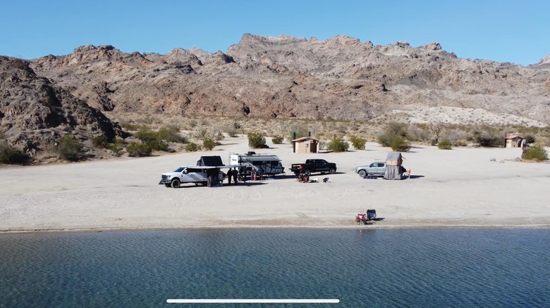 Campers along the shore at Telephone Cove
