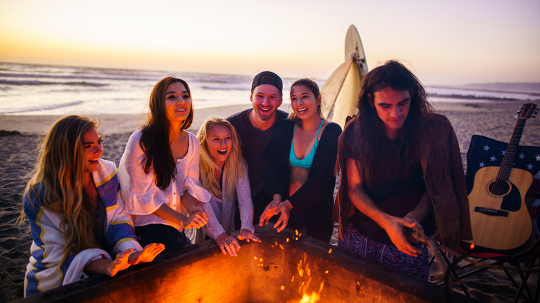 Friends at bonfire in California