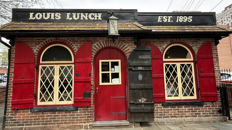 Exterior of red Louis' Lunch building