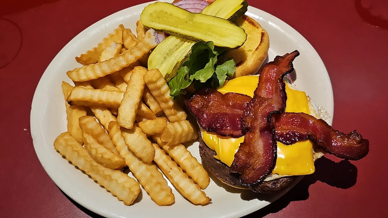 Bacon cheeseburger and crinkle fries from the Vortex Bar