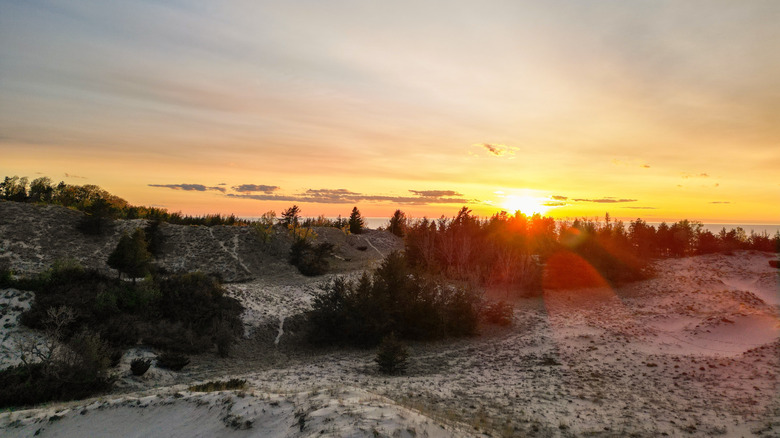 Sunset at Michigan above the sands of Nordhouse Dunes Wilderness Area, Lake Michigan