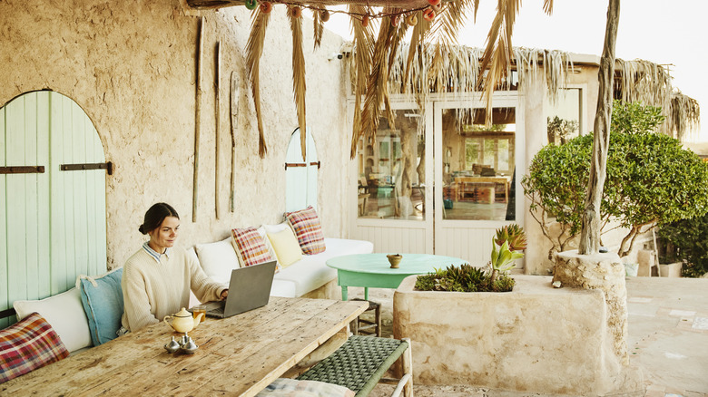 Digital nomad working at cafe