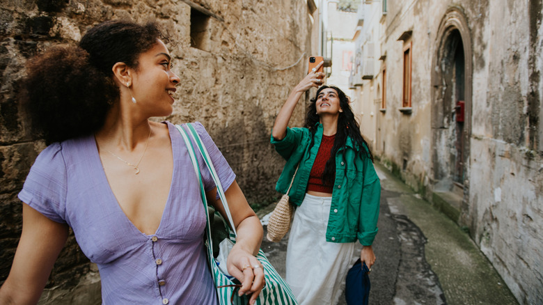 Two women posing for photos