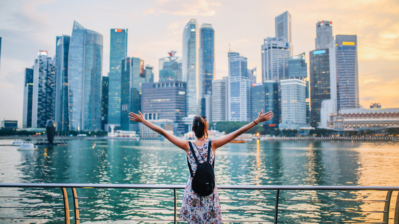 A woman with Singapore's skyline