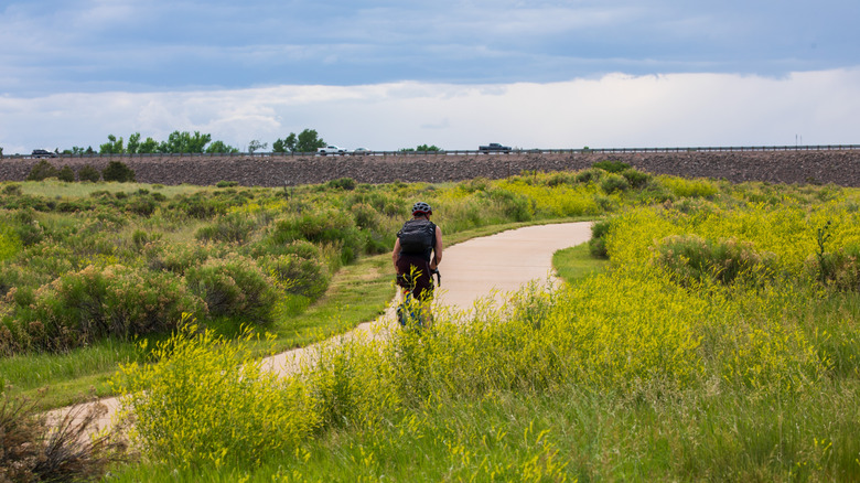 A person cycling in Denver, Colorado