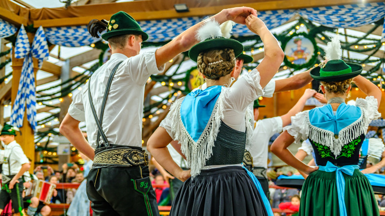 Bavarian Dancers with traditional clothes at an Oktoberfest