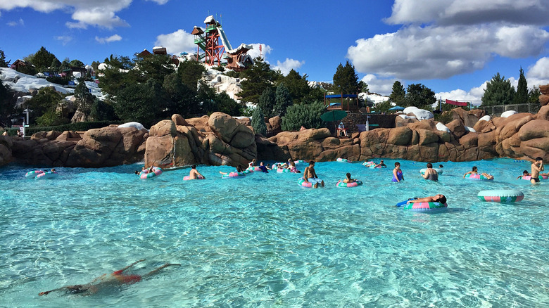 Many swimmers relaxing at Disney's Blizzard Beach Water Park in Florida