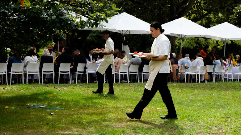 Waiters serving food at the Melbourne Food & Wine Festival