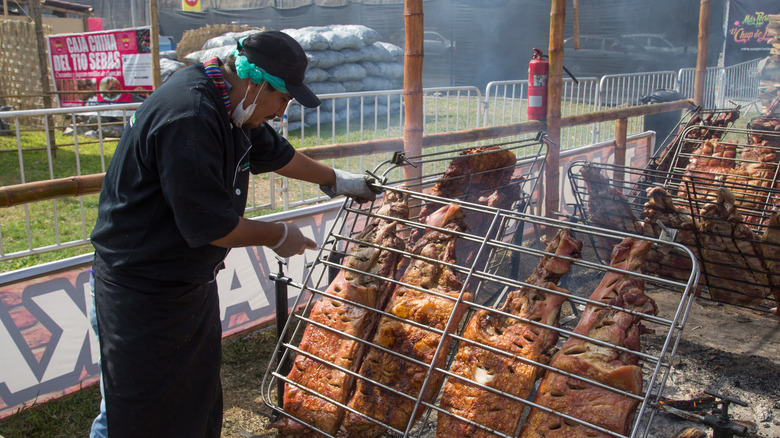 Man preparing food at Mistura