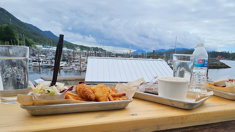 Fried fish with views of the water in the background at Alaska Fish House in Ketchikan, Alaska