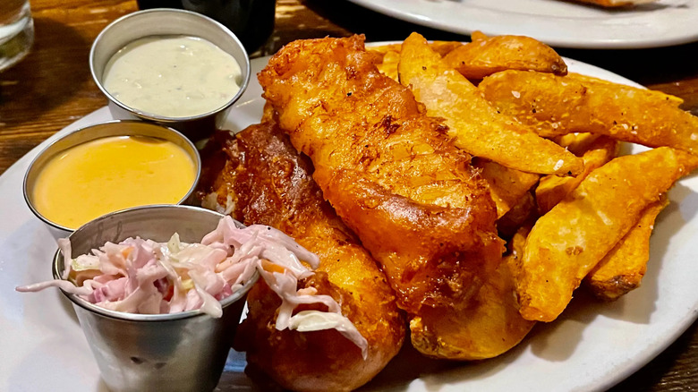 Fried fish served with chips, tartar sauce, and Mary Rose sauce at Jack Quinn's Irish Pub and Restaurant in Colorado Springs