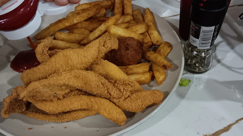Fried catfish with fries from Roy's Catfish Hut in Kinder, Louisiana