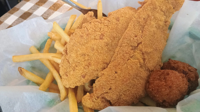 Fried fish with hushpuppies and fries from Flying Fish in Texas