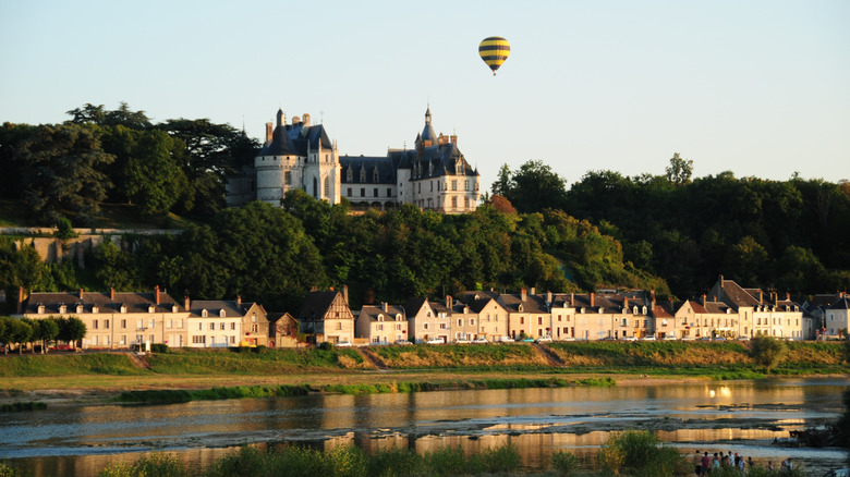 Hot air balloon over castle