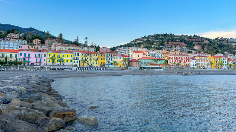 colorful houses line the shore in Ospedaletti