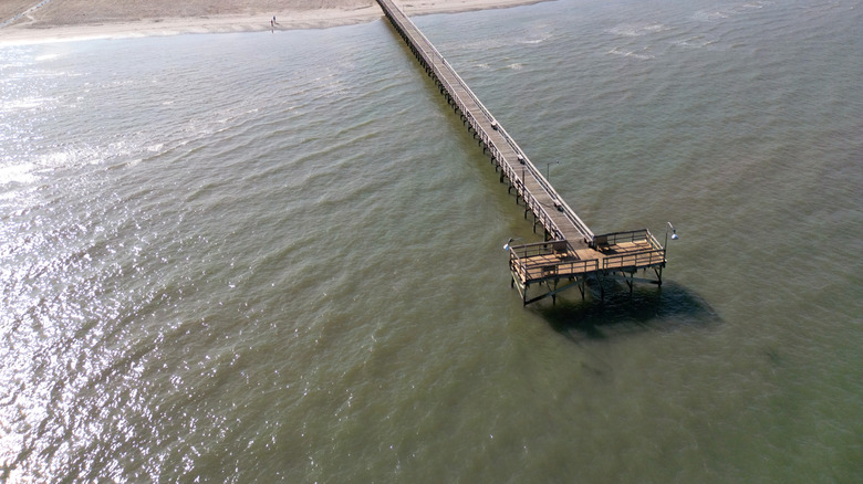 Fishing Pier Port O'Connor, Texas, alongside a long beach near the town