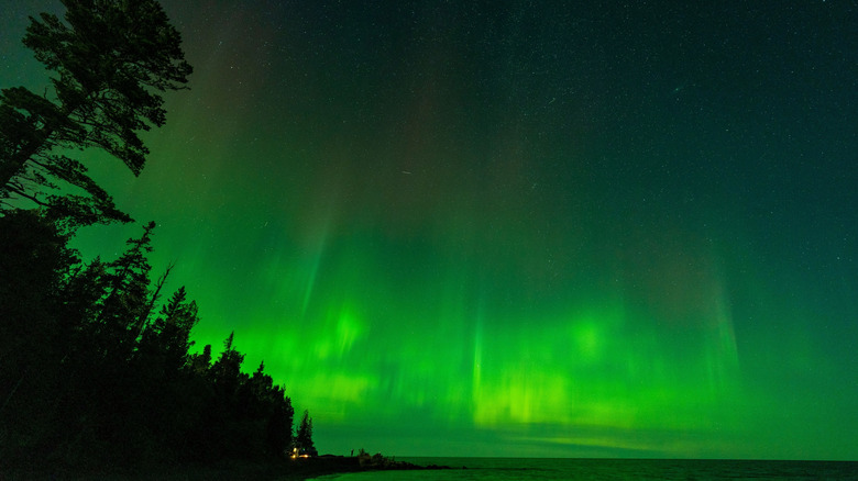 Curtain of green light over the lake waters at Keweenaw Peninsula