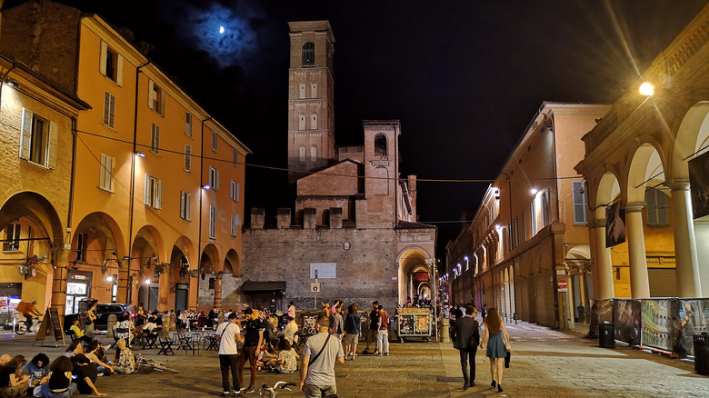 People promenading in Rome at night