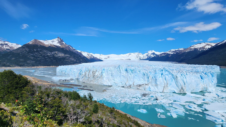 The Perito Moreno Glacier surrounded by a lake and peaks at Los Glaciares National Park, Argentina