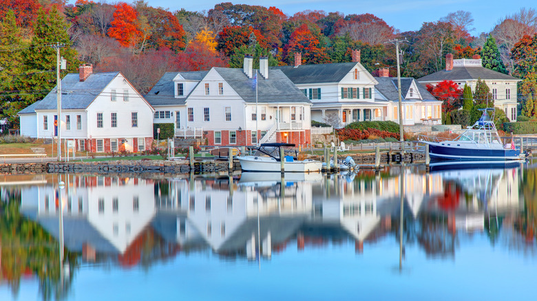 Boats along the shore of the Mystic River in Mystic, Connecticut