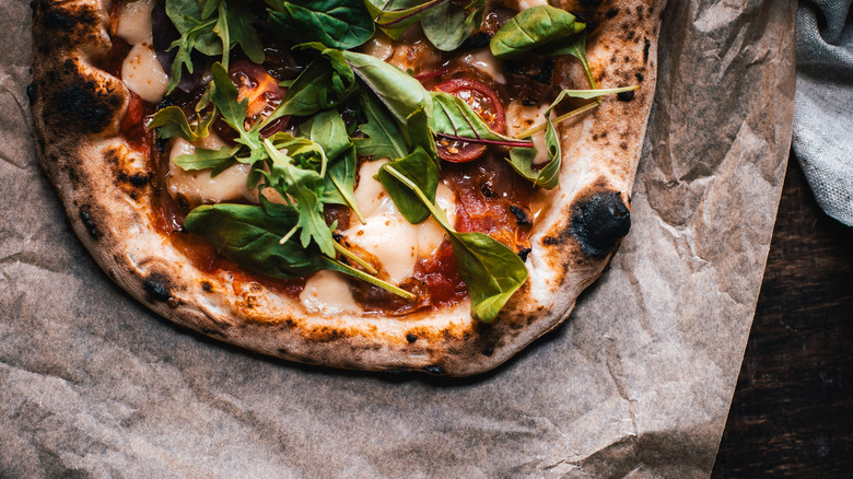 Closeup of a Napolitan pizza on the table