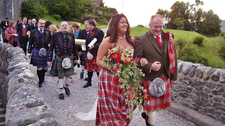 Wedding couple at Eilean Donan Castle, Scotland