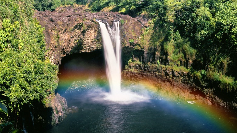 Wailua Falls waterfall in Hawaii with rainbow