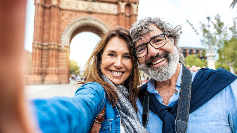 Husband and wife enjoying the city of Barcelona.