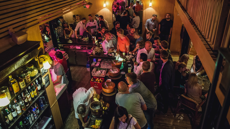 An lively evening in a Barcelona bar.