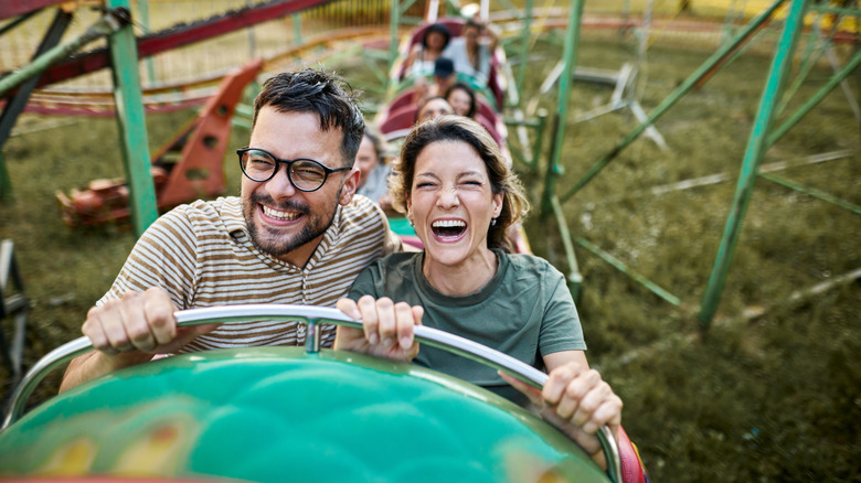 People on a roller coaster