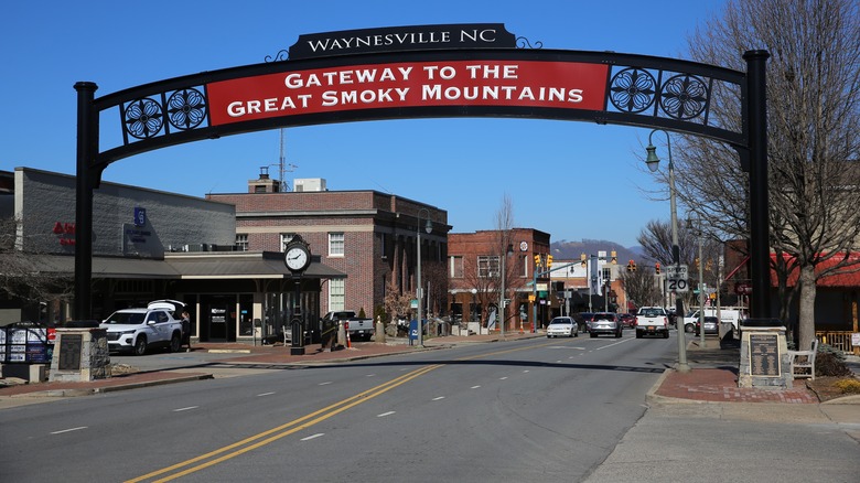 a welcome sign above a street in Waynesville, North Carolina