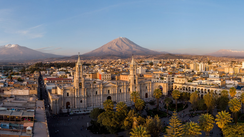 Aerial view of the Basilica Cathedral of Arequipa and the Plaza de Armas in the colonial old town in Peru at sunset