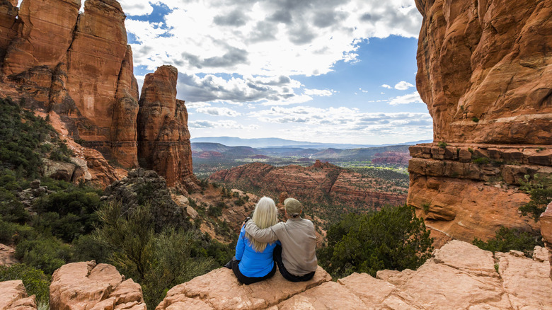 A couple with red rocks