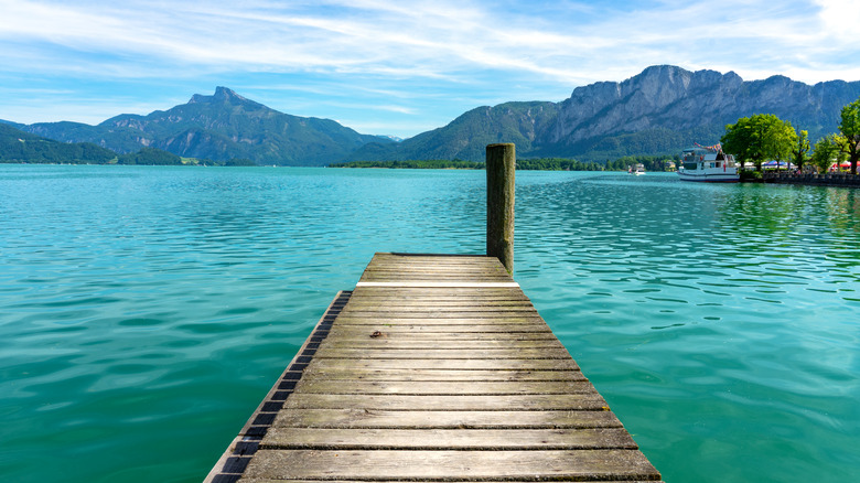 Wooden pier stretching into turquoise water