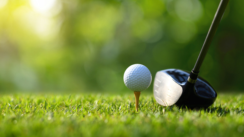 golf ball and club